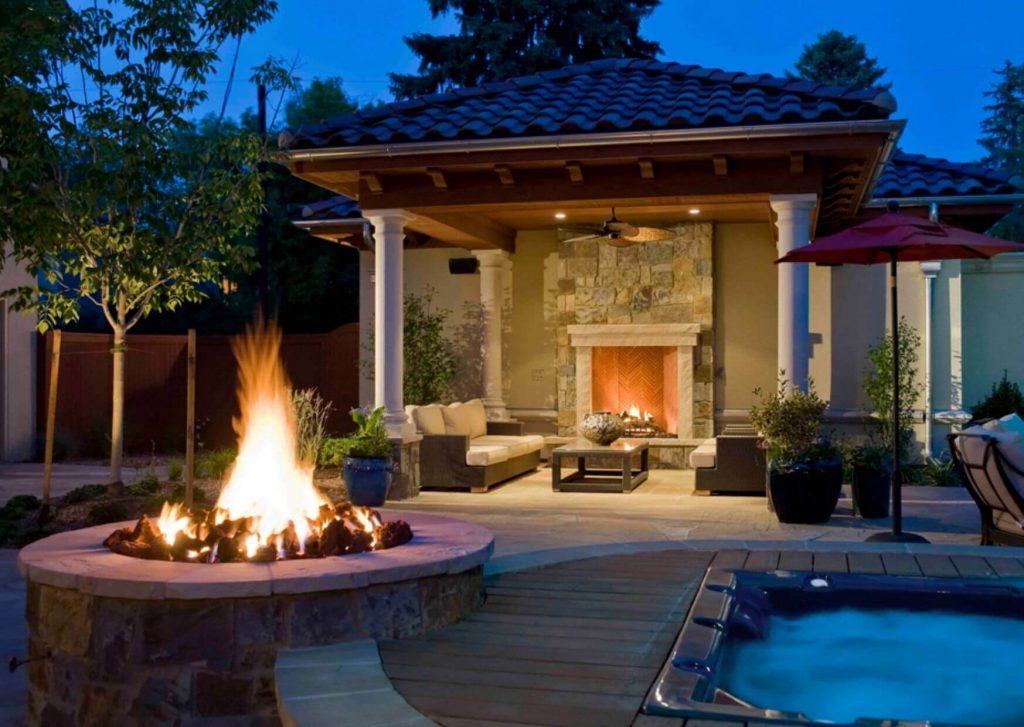 Reasons To Include A Fire Pit Around Your swimming Pool