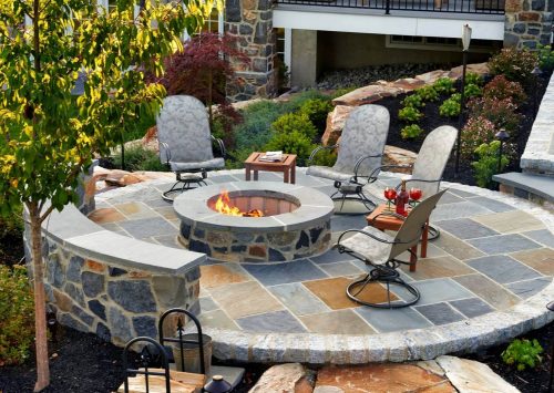 Reasons To Include A Fire Pit Around Your swimming Pool