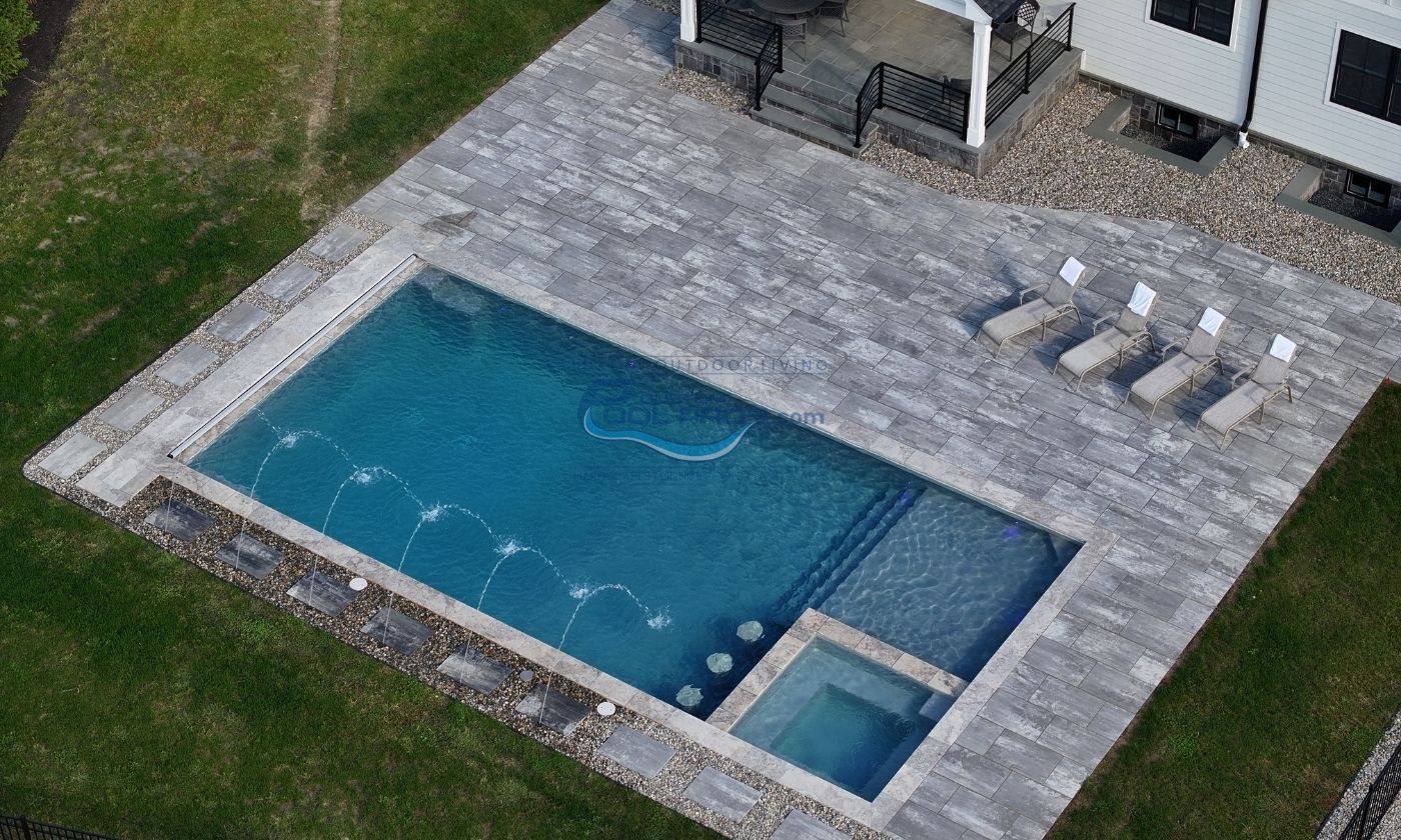 Stone and Water Combined in a Spacious Poolside Retreat in Washington