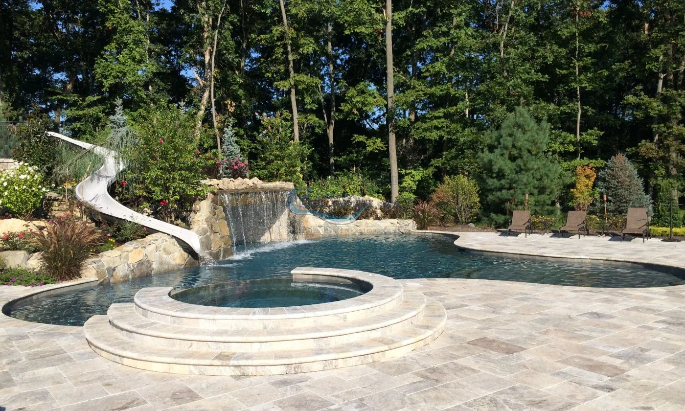 gunite-pool-with-custom-slide-and-raised-circular-spa-in-NJ.jpg